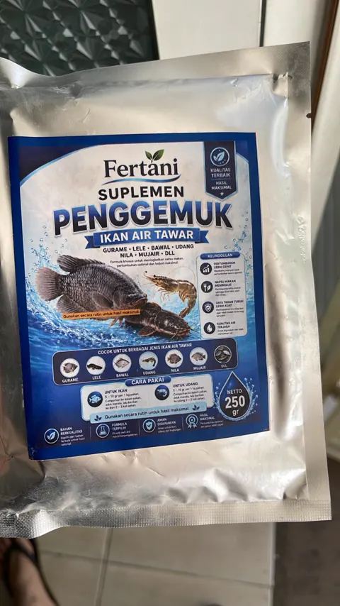 Foto kemasan asli Fertani Suplemen Penggemuk Ikan, netto 250 gram, dengan bagian Cara Pakai di label